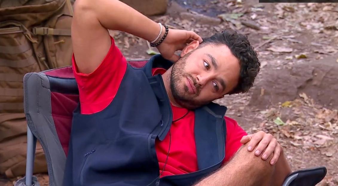 Adam Thomas relaxing in camp.