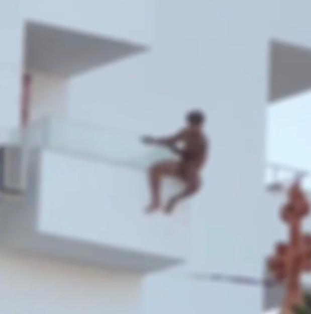 **FULL COPY BY NATALIA PENZA natypenza@gmail.com**.-TEL: +34 659 567 821** .THIS is the horror moment a man falls 100ft from a seventh-floor balcony in an Ibizan holiday resort.
