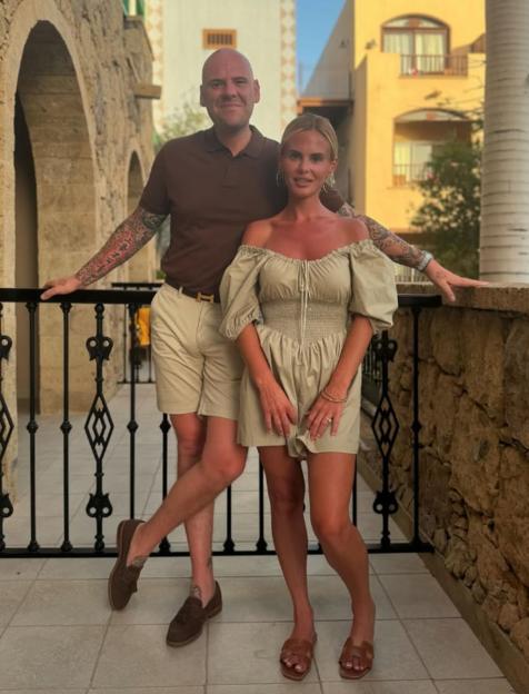 Kaylie Kelliher, Joe Bushnell, and daughter Boe Bushnell standing together.