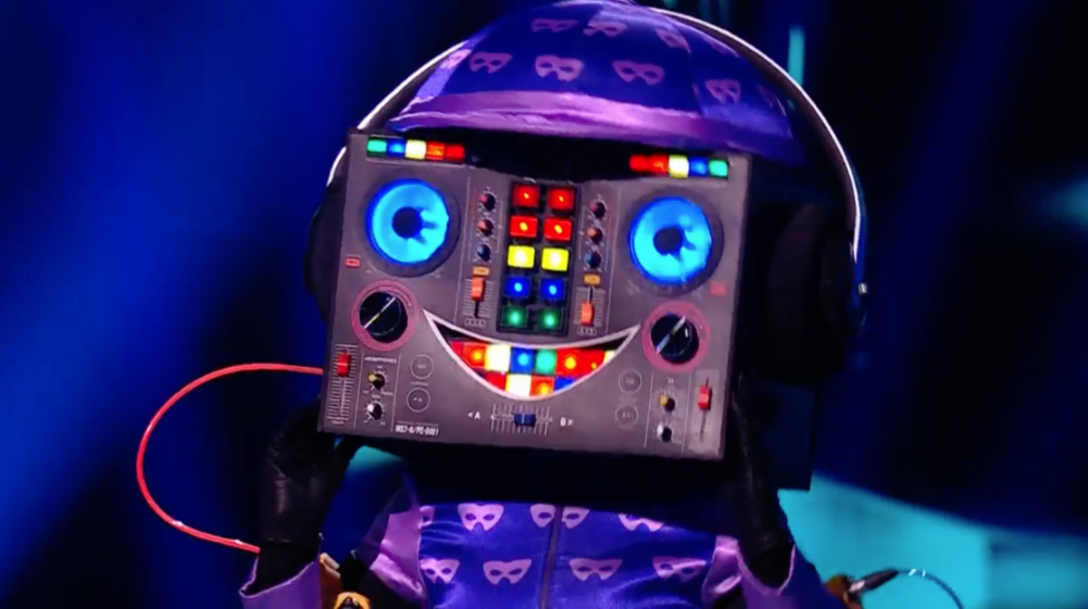 Masked Singer's DJ Unmasked as a Top TV Host – Fans Stunned by the Reveal!