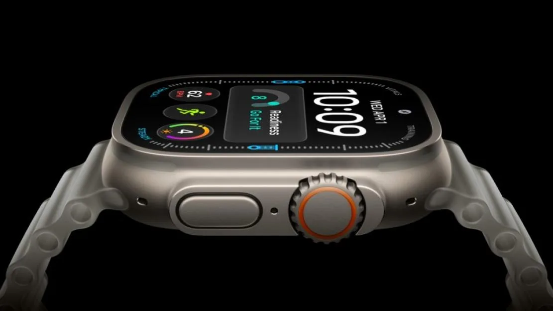 Illustration of an Apple Watch Ultra viewed from the side, showcasing its digital crown and side button against a black background.