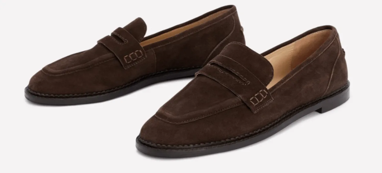 Pair of brown suede penny loafers.