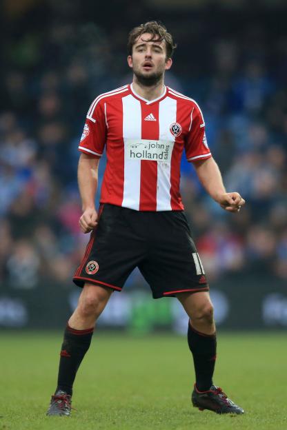 Jose Baxter of Sheffield United on the field in his team's uniform.