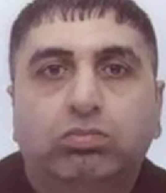 Mugshot of Mohammed Zameer Sadiq.