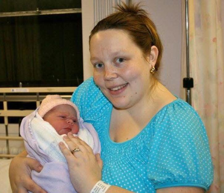 Becky Harris holding her baby.