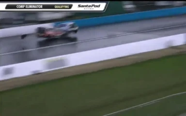 Moment car flies over circuit barrier after 170mph crash with rival in drag racing championship – as ‘three injured’