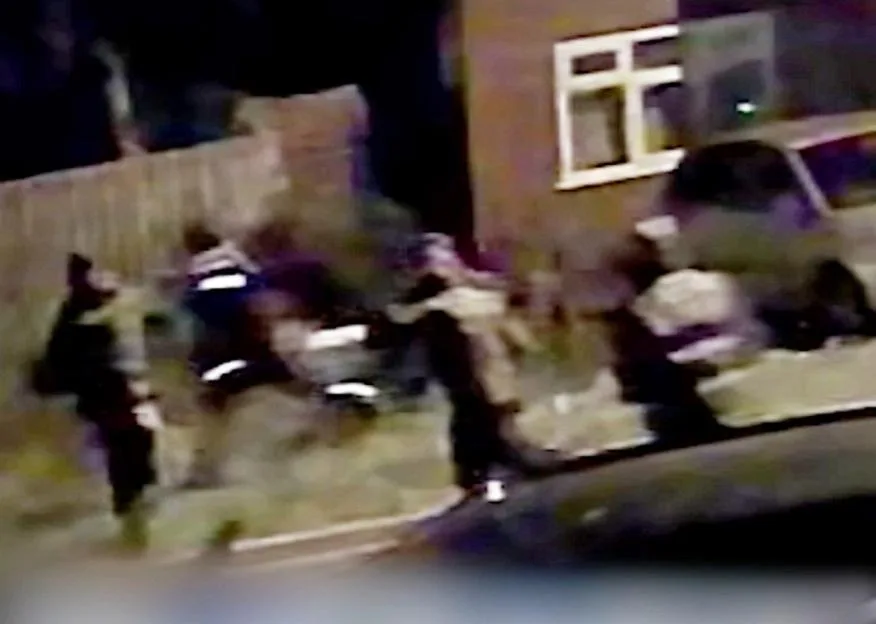 CCTV footage showing an attack by five men in balaclavas.