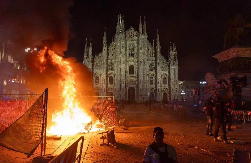 Italy descends into chaos as hooded teens smash up & loot shops with PM blaming ‘hooligans’ as Europe battles more riots