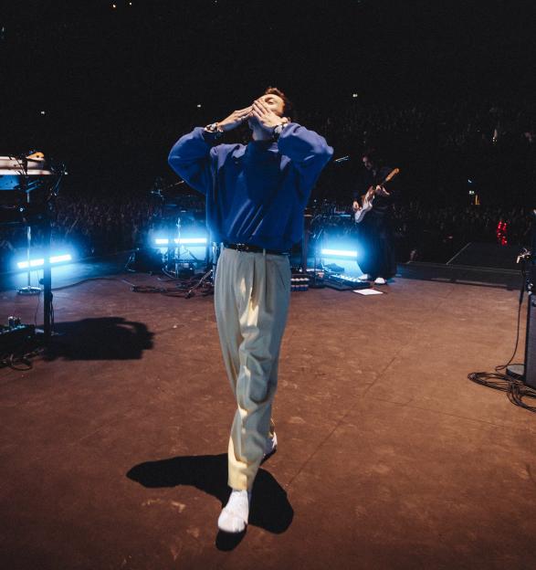 Harry Styles on stage at Manchester's Co-op Live, performing songs from his new album.