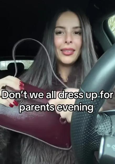A woman in a car wearing a fur coat and holding a burgundy purse, with text overlay "Don't we all dress up for parents evening".