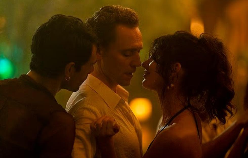 Night Manager Fans Are 'Gasping' Over Tom Hiddleston's 'Threesome' Scene—His Sexiest Moment Yet!