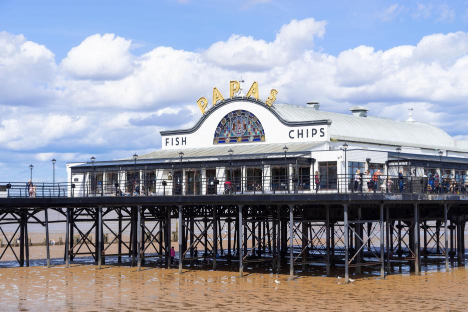 Exploring the UK's Top Seaside Resort: Home to the Biggest Chippy, Best Pier, and Affordable Family Stays for Just £6!