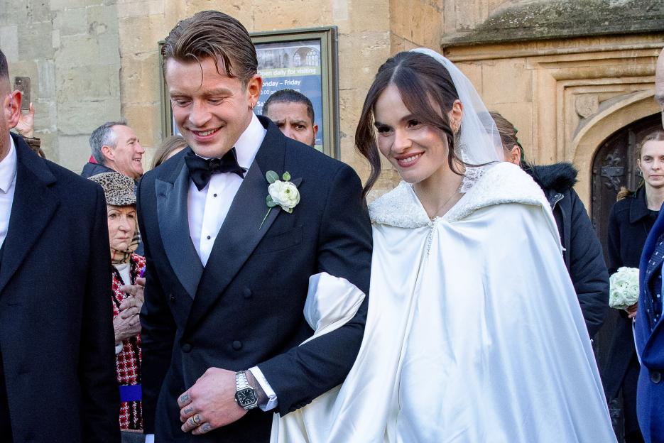Adam Peaty and Holly Ramsay leaving Bath Abbey after their wedding.