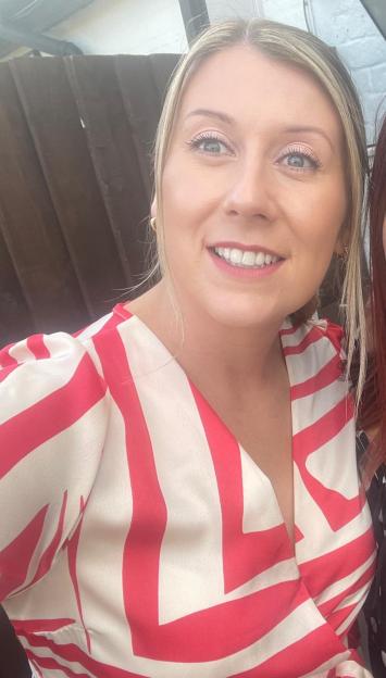 Stacey Hillier smiling.