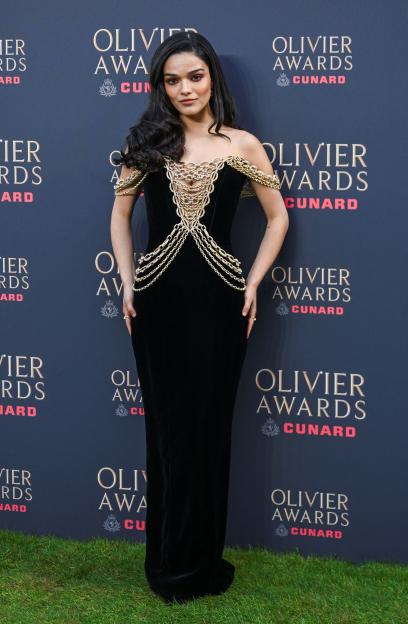 Rachel Zegler on a green carpet for the Olivier Awards.