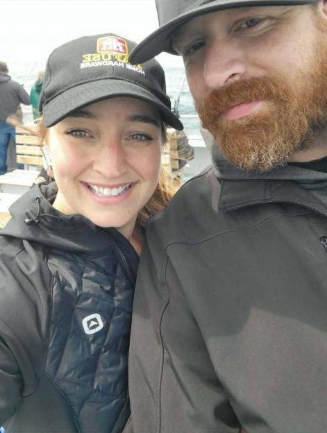 Alicia Scott and Kris Spencer smiling at the camera.