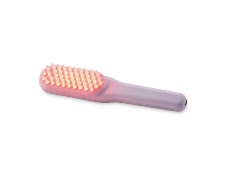 Purple hairbrush with illuminated bristles.