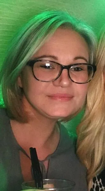 Eleanor Barnfield wearing glasses.