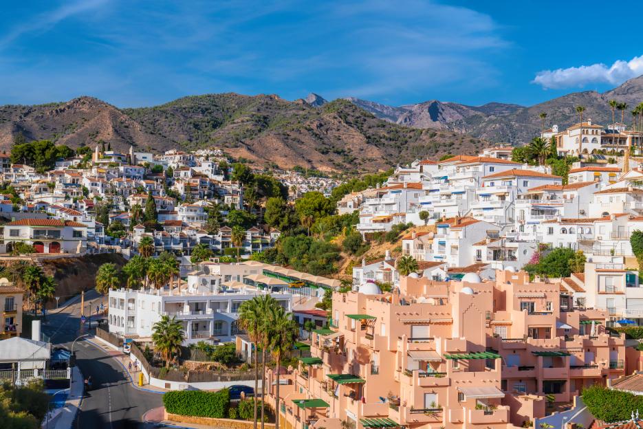 Burriana residential houses and villas on a hillside in Nerja, Spain.