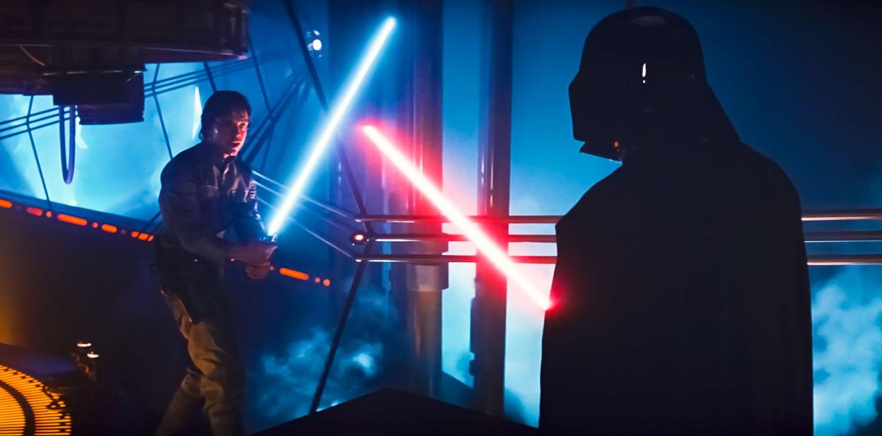 Luke Skywalker fighting Darth Vader with lightsabers in Star Wars: Episode V - The Empire Strikes Back.