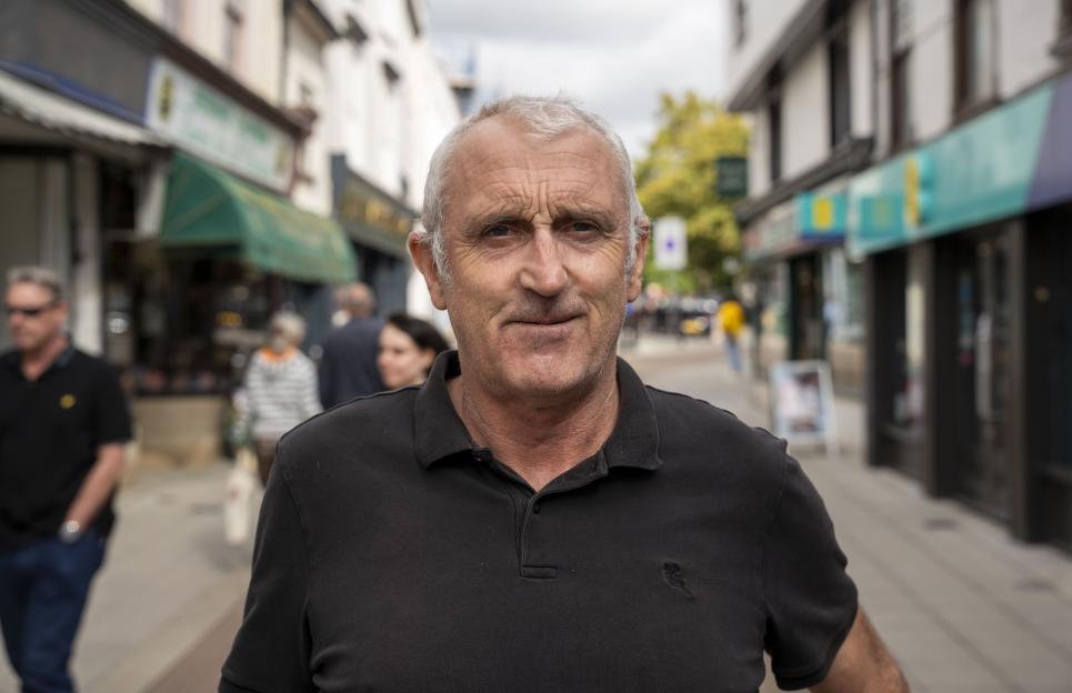 Ricky Freelove posing in Braintree, Essex, where Reform has introduced security patrols.