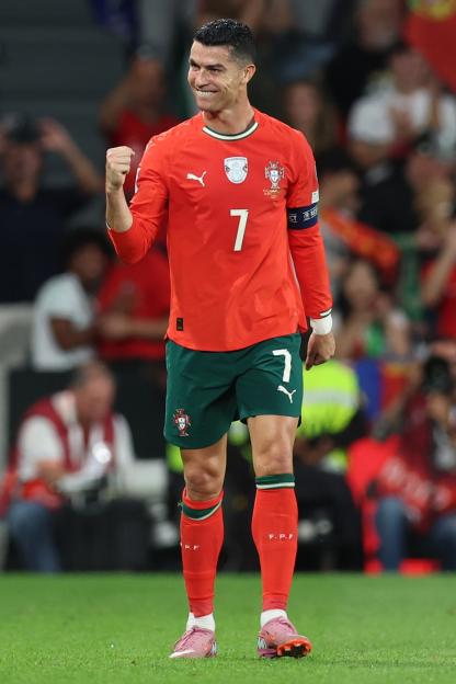Cristiano Ronaldo celebrates his goal during a FIFA World Cup 2026 qualifier match.