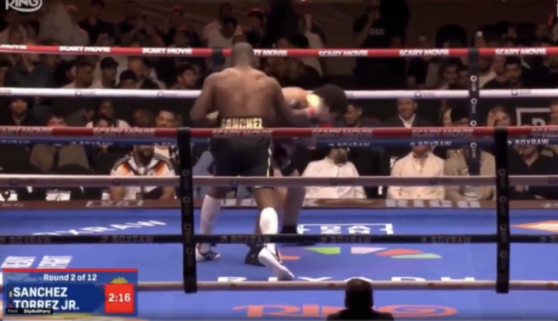 A boxing match in the second round, with boxer Sanchez facing Torrez Jr. in the ring.