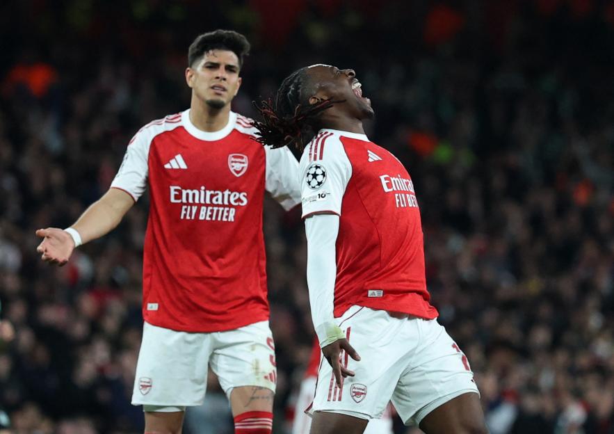 Arsenal's Eberechi Eze and Piero Hincapie react during a UEFA Champions League match.