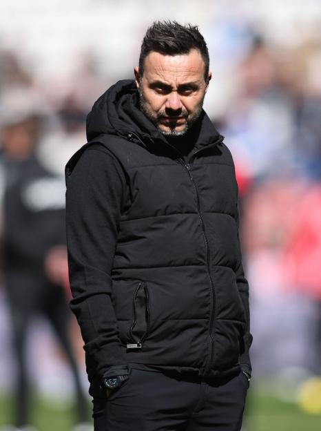 Roberto De Zerbi, head coach of Tottenham Hotspur, on the sideline during a match.