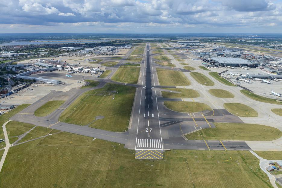 Aerial view looking west down runway 27L at Heathrow Airport, London.