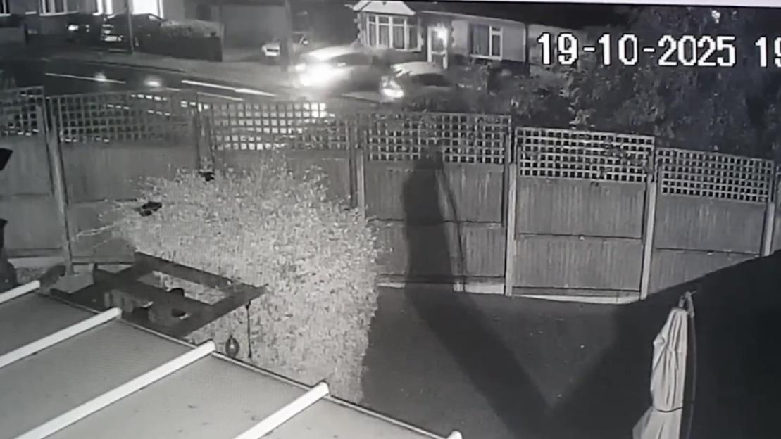 Video grab of a drunk driver crashing a silver Vauxhall Astra into a bungalow.