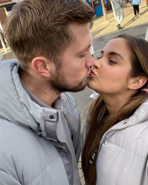 Jacqueline Jossa kissing her husband Dan.