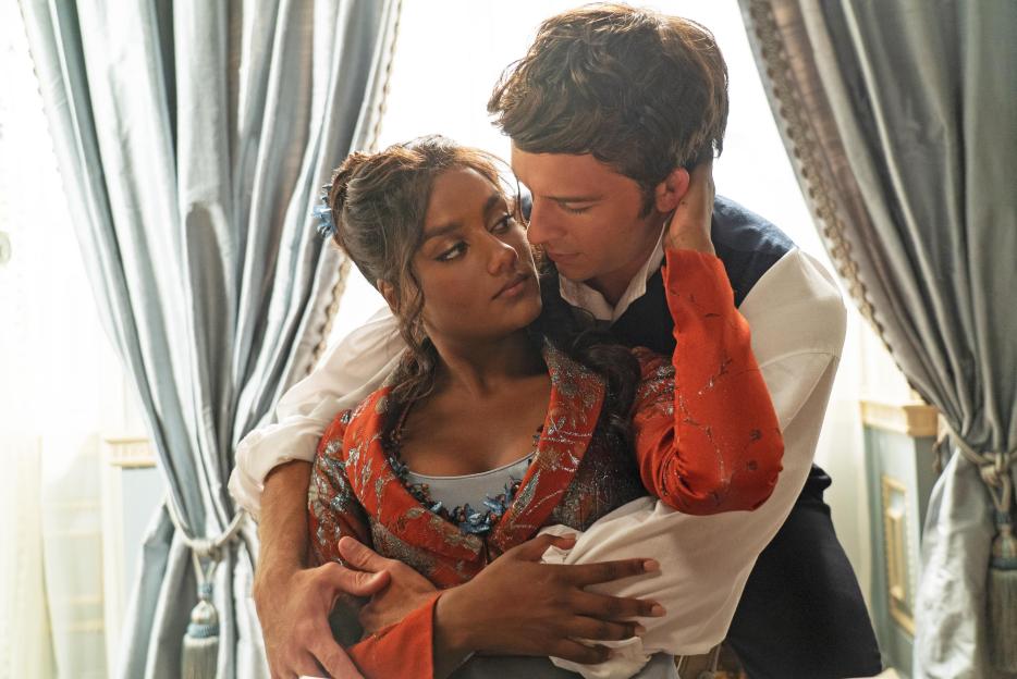Simone Ashley as Kate Sharma and Jonathan Bailey as Anthony Bridgerton embrace.