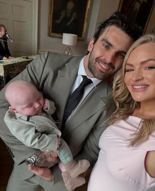 Laura Woods, Adam Collard, and their baby.