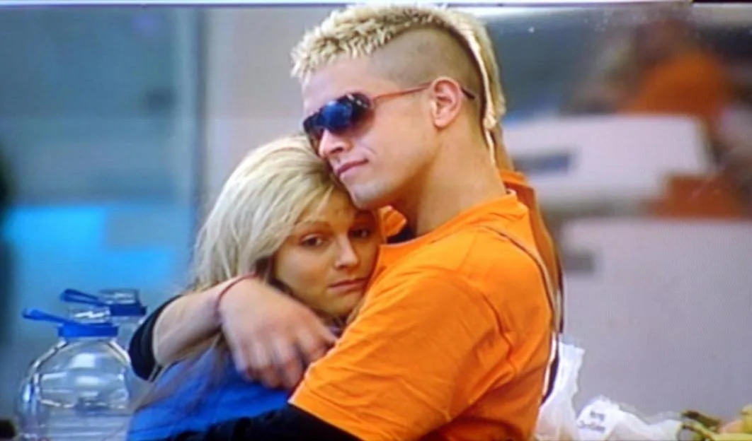 Contestants Pete Bennett and Nikki Grahame hugging on the TV programme 'Big Brother 7'.