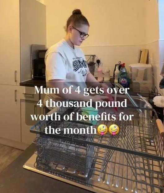 A woman washing dishes in a kitchen, with text overlay: "Mum of 4 gets over 4 thousand pound worth of benefits for the month."
