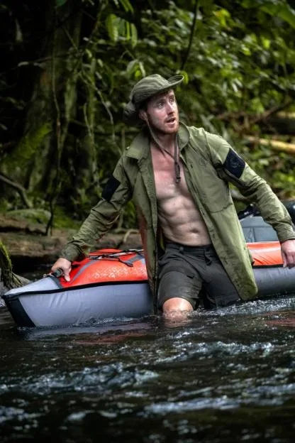 Adventurer who was held at gunpoint & nearly died from malaria braves jungle on inflatable kayak in croc-infested water