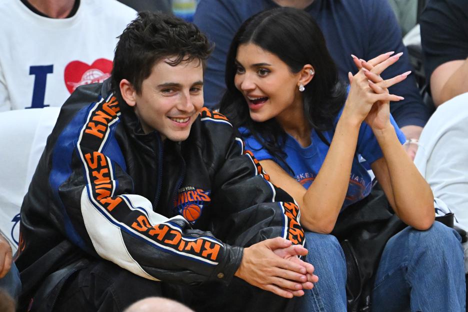 Actor Timothée Chalamet and Kylie Jenner attend an NBA game.