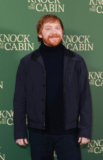Rupert Grint smiling at the special screening of "Knock At The Cabin".