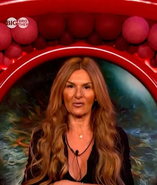 A woman with long blonde hair speaking in the Big Brother diary room, with subtitles at the bottom.