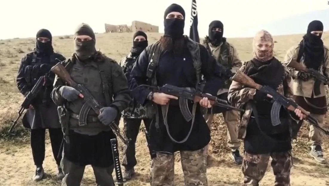Islamic State of Iraq and the Levant propaganda photo showing masked militants in Syria.