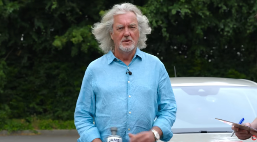 James May in a light blue shirt looking at the camera.