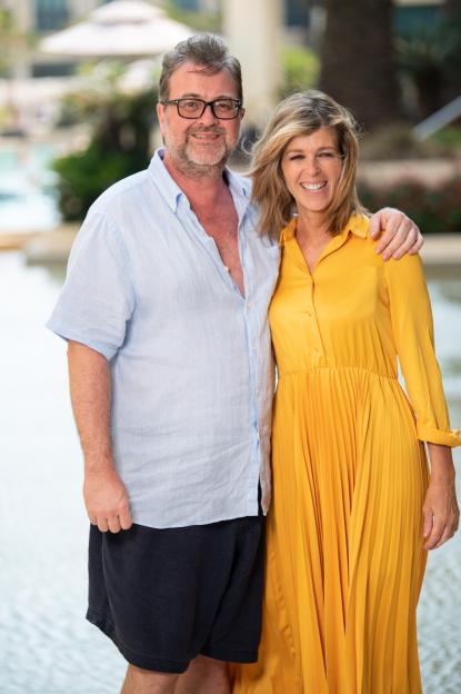 Derek Draper and Kate Garraway posing together at the Versace Hotel in Australia.