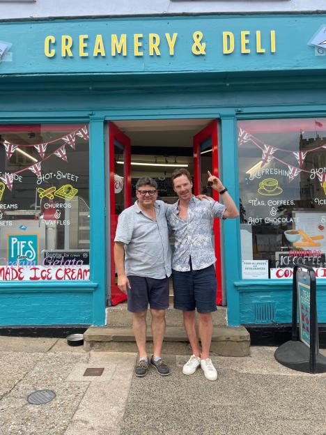 Ugur Vata, owner of The Gallery Creamery and Deli, with actor Benedict Cumberbatch outside his shop.
