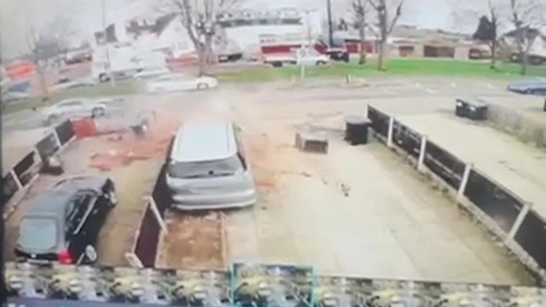 'High-Speed Car Crash Wreaks Havoc in Gardens as Police Search for Two Suspects'