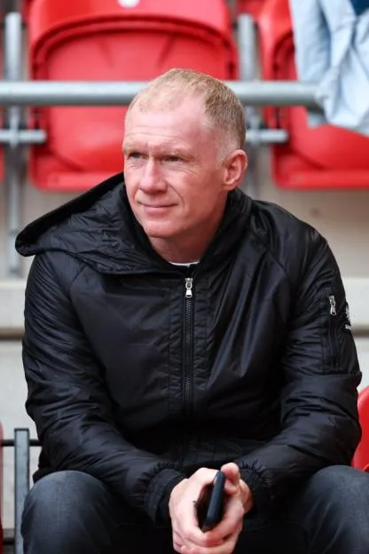 Paul Scholes sitting in the stands during the match between Rotherham United and Salford City.
