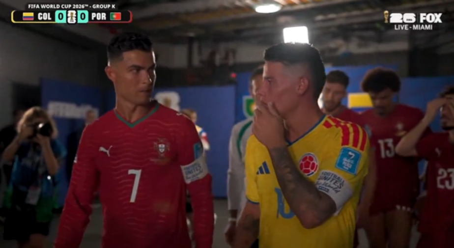 A screenshot showing soccer players Cristiano Ronaldo in a red uniform and a Colombian player in a yellow uniform, both looking at each other.