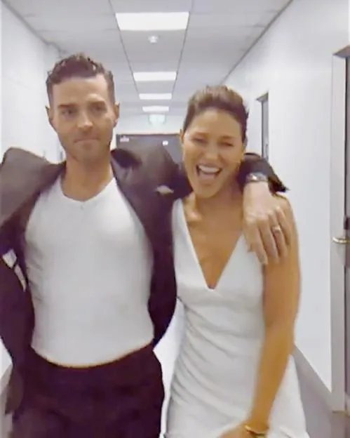 Emma Willis and husband Matt walking backstage at Strictly Come Dancing.