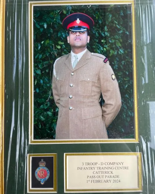 Framed pass out parade photograph of British soldier Yudhisingh Jussun.