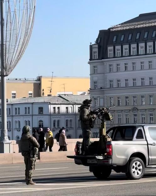 Putin Tightens Moscow's Security Grip: Armed Officers Patrol Streets Amid Internet Blackout
